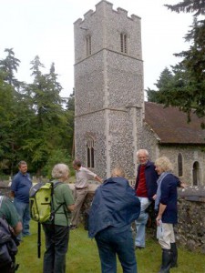 Bob Carr interpreting the use of flint on Santon Downham church as part of the 6th July training day. Photo by Alan Spidy